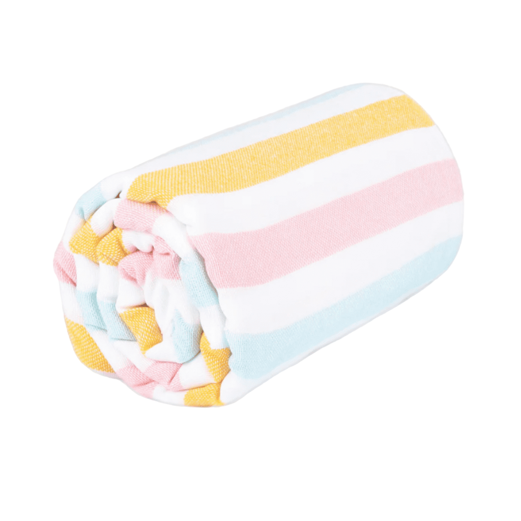 Rolled beach towel with yellow, pink, blue, and white stripes on white background