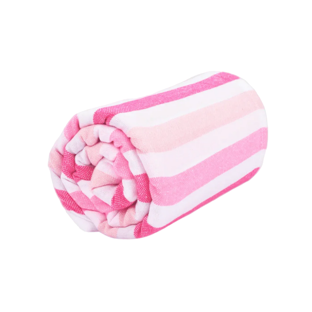 Rolled pink and white striped beach towel on white background