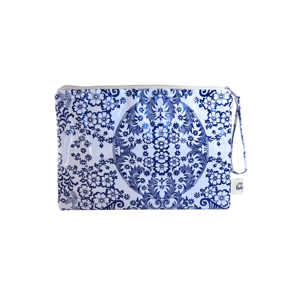 Blue and white patterned pouch on a white background