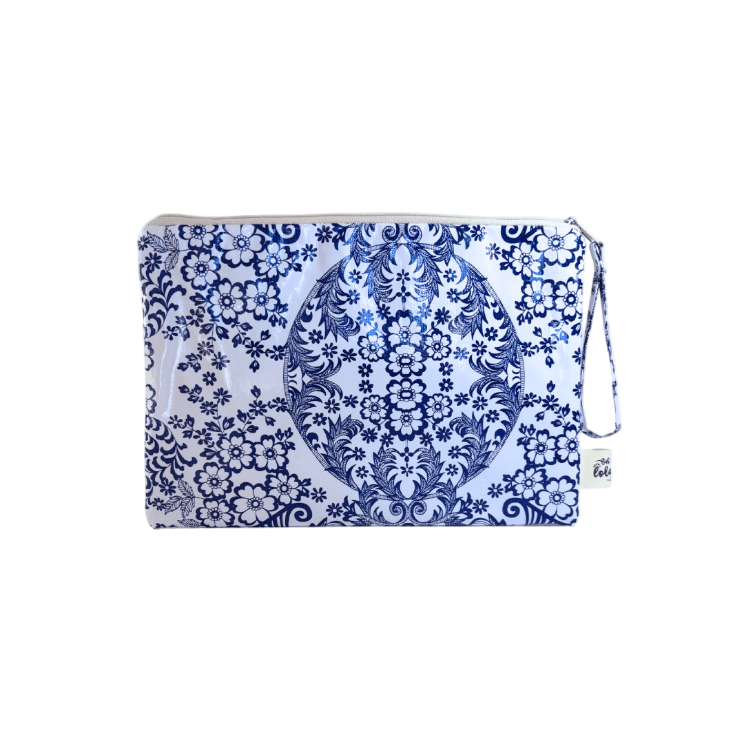 Blue and white patterned pouch on a white background
