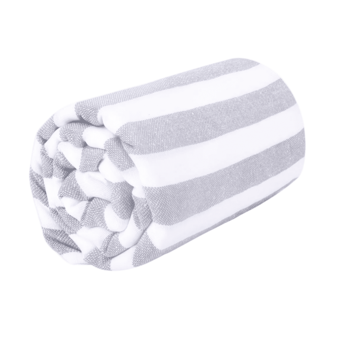 Rolled gray and white striped cotton beach towel isolated on white