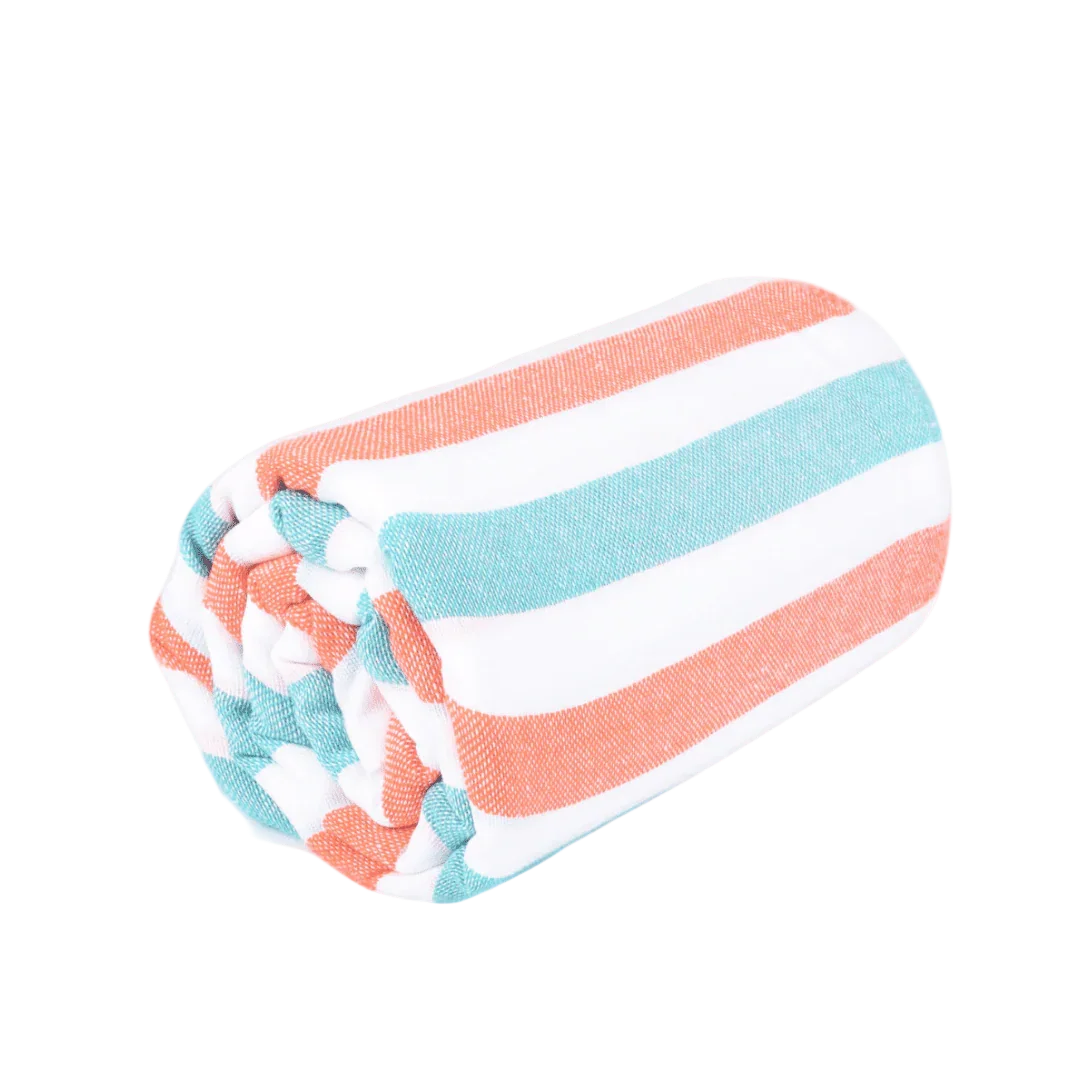 Rolled striped beach towel with coral, turquoise, and white colors on black background