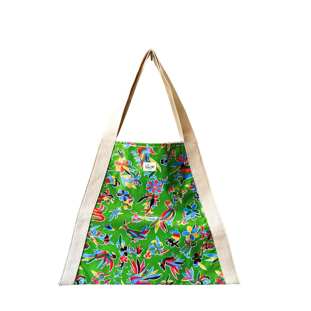 Green tote bag with colorful floral and bird pattern and beige handles, eco-friendly reusable shopping bag
