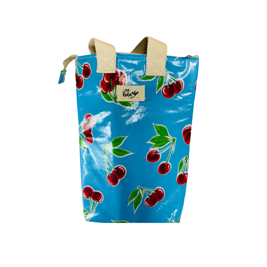 Blue cherry print tote bag with beige handles and zipper closure