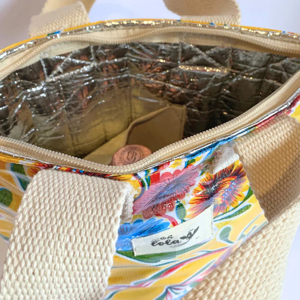 Open floral insulated cooler bag with cream strap and silver quilted interior lining