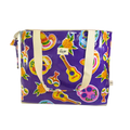 Purple tote bag with colorful Mexican-themed prints including guitars, sombreros, maracas, skulls, and marigold flowers