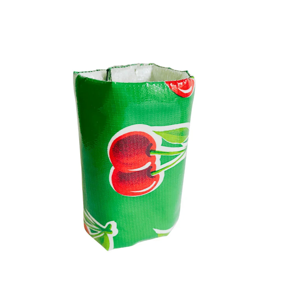 Green ceramic vase with red cherry print isolated on white background