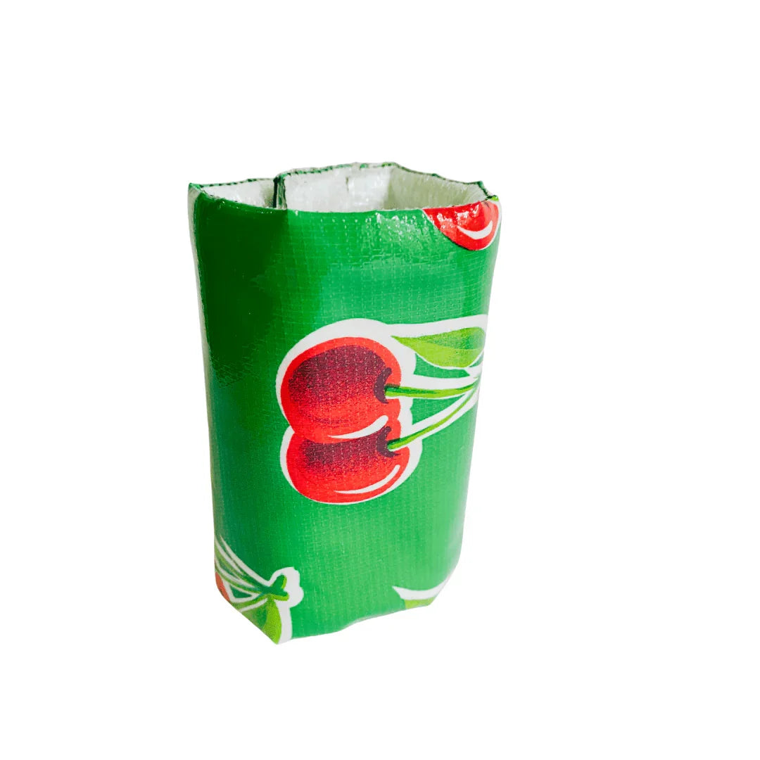 Green ceramic vase with red cherry print isolated on white background