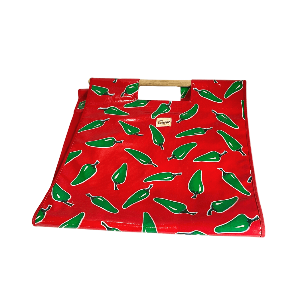 Red tote bag with wooden handle and green chili pepper pattern, colorful reusable shopping bag