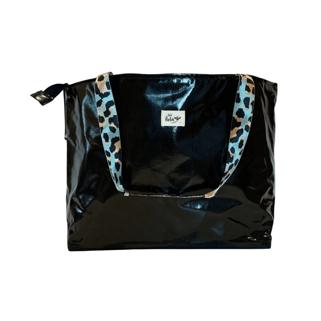 Black bag with leopard print handles on a white background