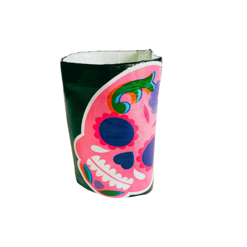 Black cylindrical cup holder with pink Day of the Dead sugar skull design