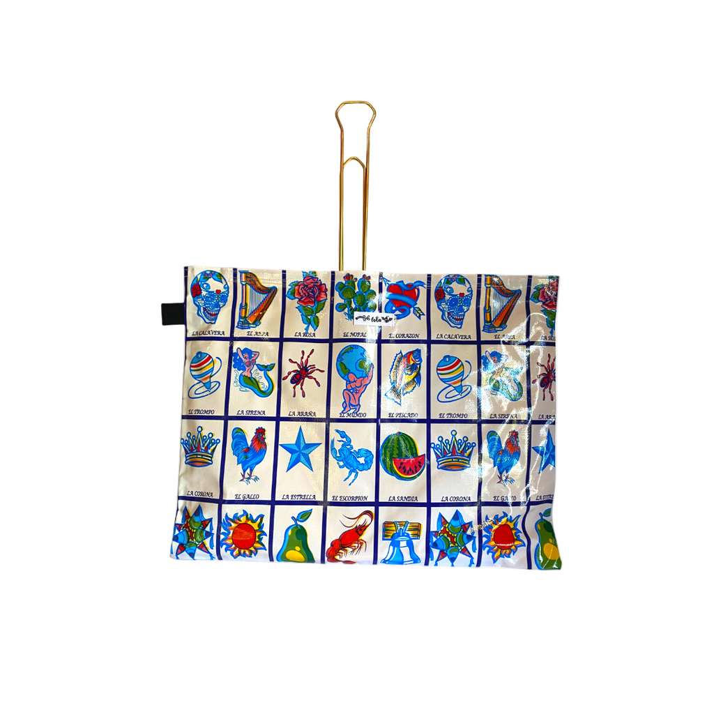 Colorful tote bag with Lotería card icons including La Calavera, El Arpa, La Rosa, and El Corazón