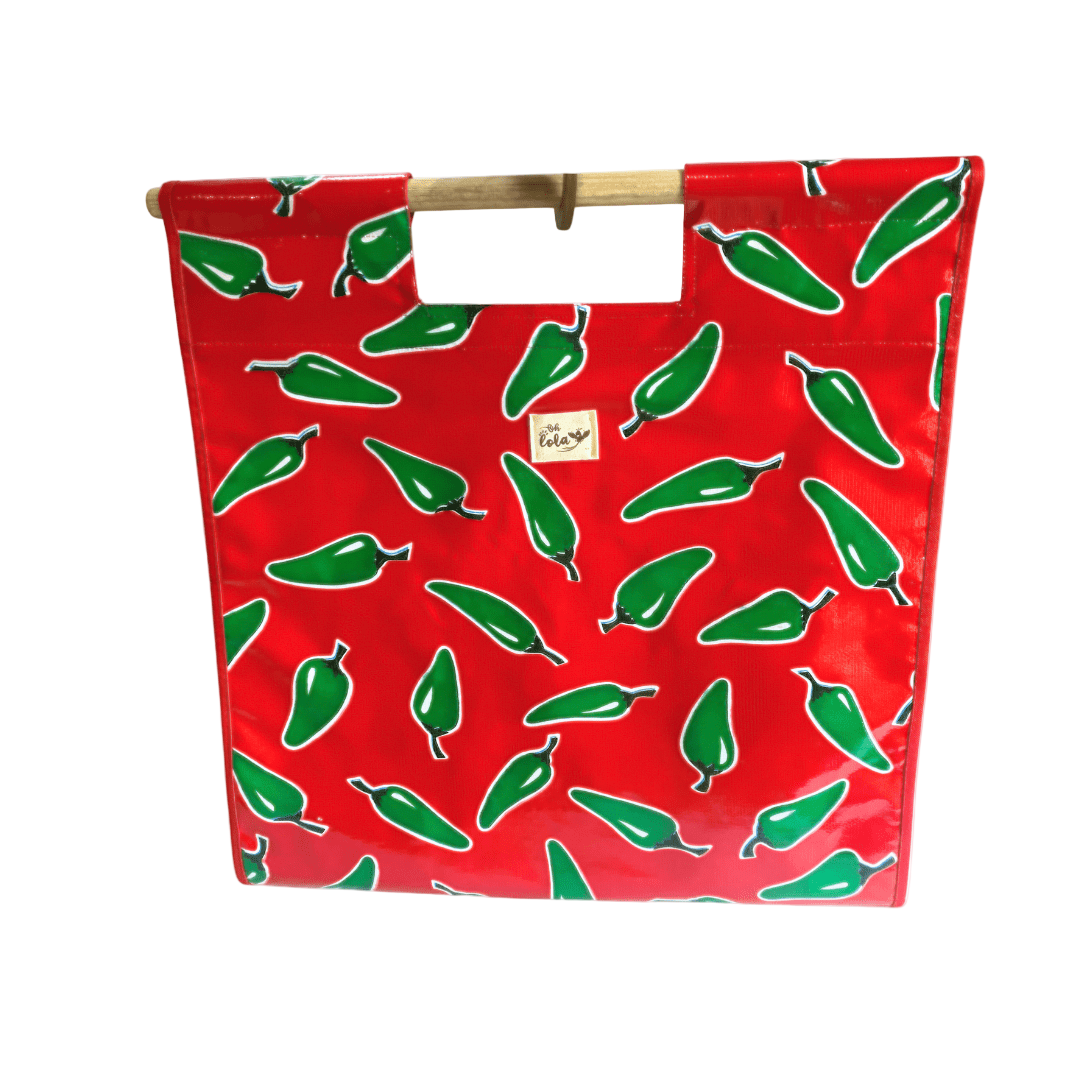 Red tote bag with green chili pepper print and wooden handles