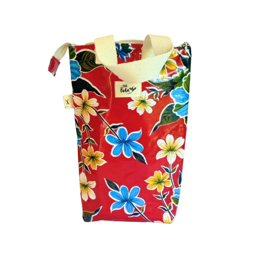 Red floral print tote bag with blue, yellow, white flowers and cream handles