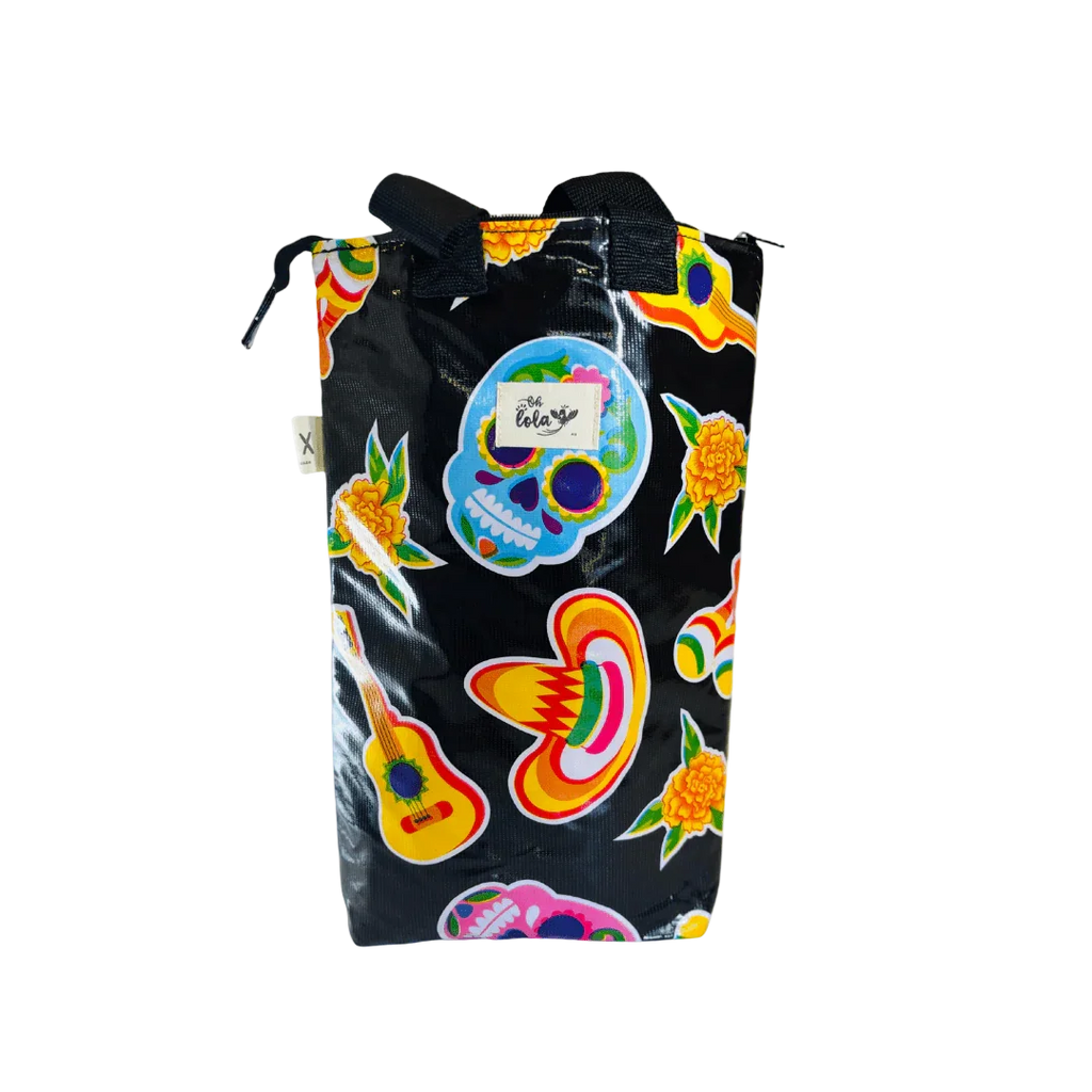 Black bag with colorful Day of the Dead sugar skulls, sombreros, marigold flowers, and guitar designs