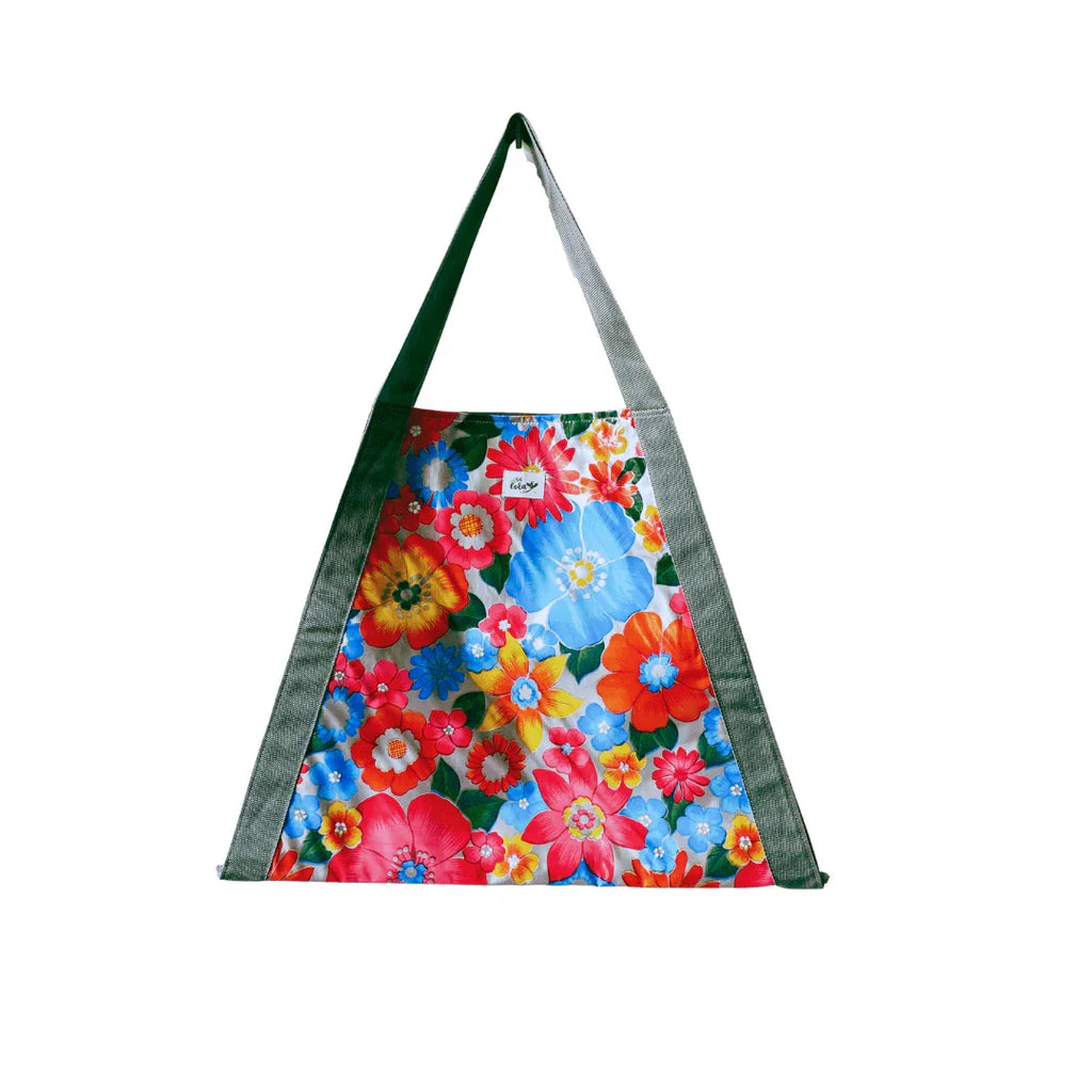 Colorful floral print apron with adjustable neck strap and green side panels